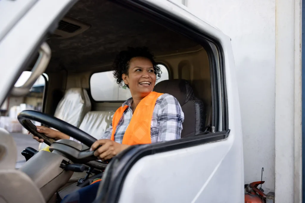 Joyful truck driver getting ready to head out on the road