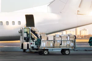 Packages being loaded onto plane